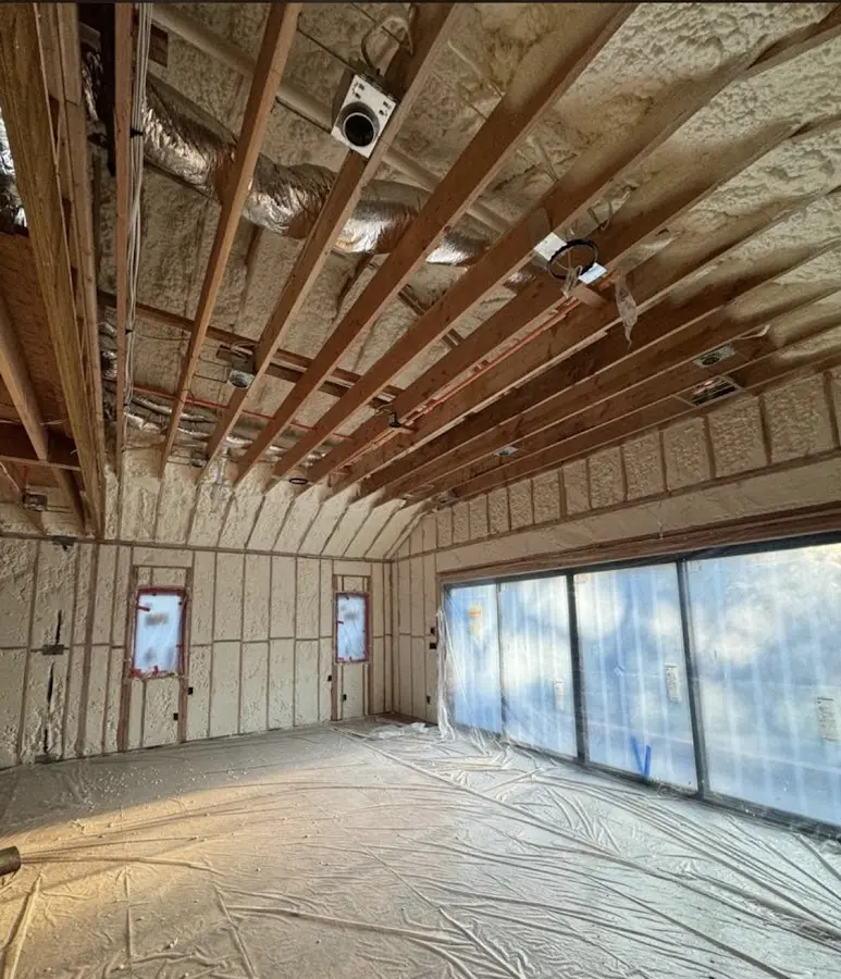 Interior walls and ceiling insulated with spray foam during new construction in Cabot